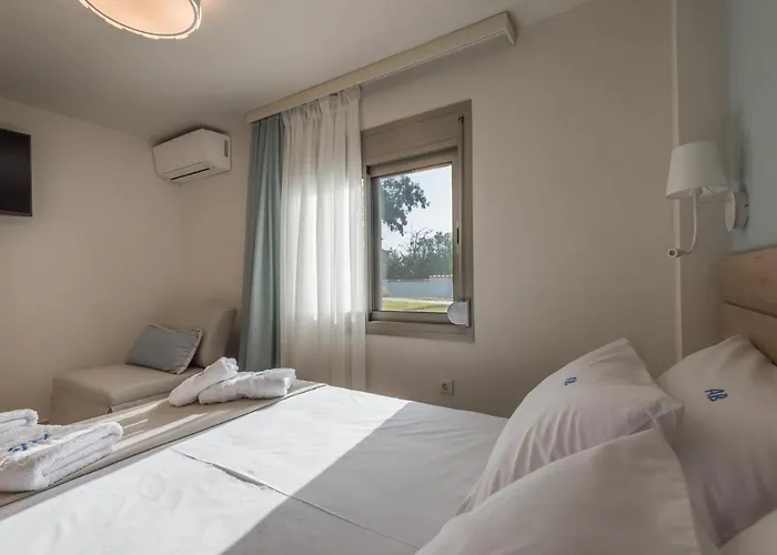 Апартаменты Arelia Beachfront Sea View